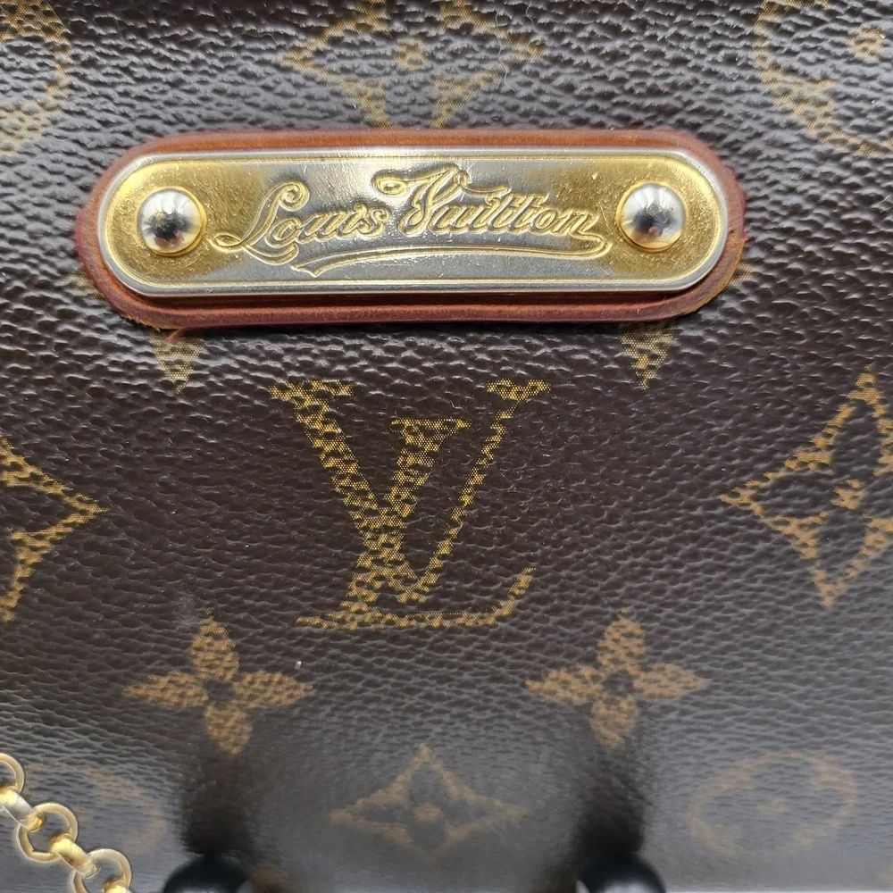 LOUIS VUITTON Eva Monogram Leather Pochette Bag..Authentic..